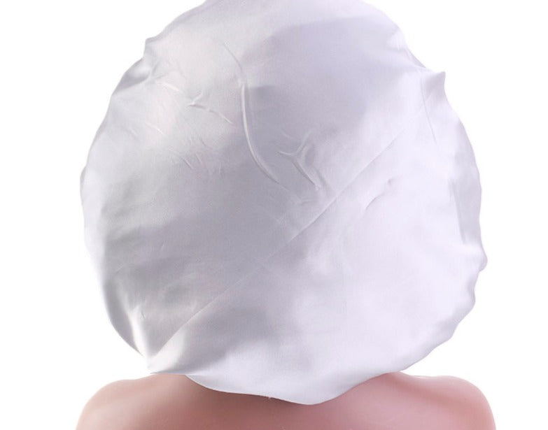El gorro por detras